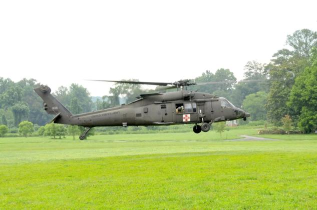 A National Guard Blackhawk helicopter lands at Harrison Park in Ellijay.