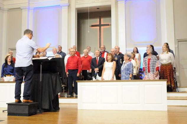 The First Baptist Church of Ellijay’s choir sings patriotic music at the church’s Patriotic Celebration.