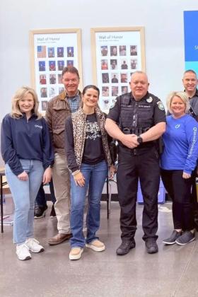 Community supporters and law enforcement gather to show support. Shown from left are Amber Davenport, Tacie Jo Bracken, Randy Long, Ellijay Police Department (EPD) Assistant Chief Ray Grace, Betsy Kelly, and EPD Detective Doug Colburn.