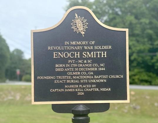 A marker in Gilmer County honors American Revolutionary War veteran Private Enoch Smith.