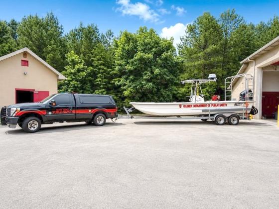 Gilmer County Fire Rescue hooks up a boat to practice for swift water emergencies.
