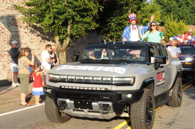 Uncle Sam and the Statue of Liberty join the Ellijay Fourth of July parade.