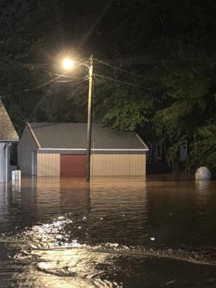 Floodwaters from Cox Creek rose during the Tuesday, July 28 storm, damaging the Coosawattee Shrine Club and other local buildings.