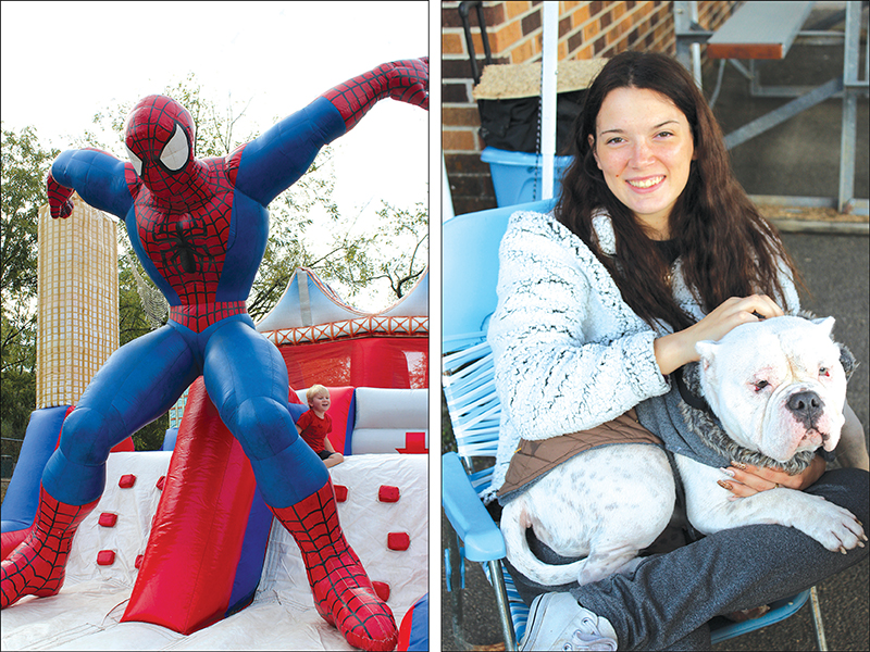 Left, Henry Cavataio, 4, of Roswell, makes sure his mom Laura is close by as he plays around a gigantic Spiderman at the kids’ section of the Apple Festival. Right, Abbey, a representative of the Cherokee Humane Society, is held at the Apple Festival by Alyssa Goodwin, of Blue Ridge.