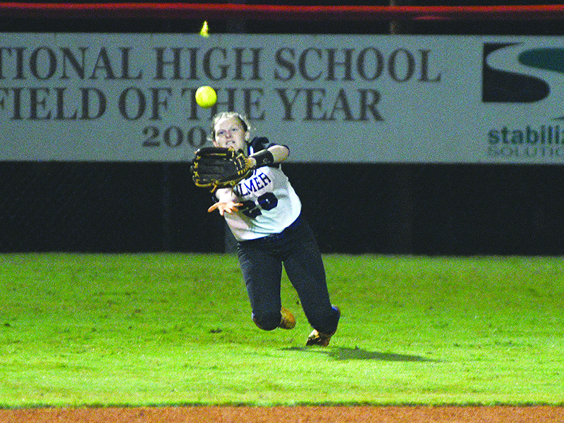 Gilmer left fielder Jacie Bennett makes a diving catch during game two of last Tuesday’s doubleheader against Madison County.