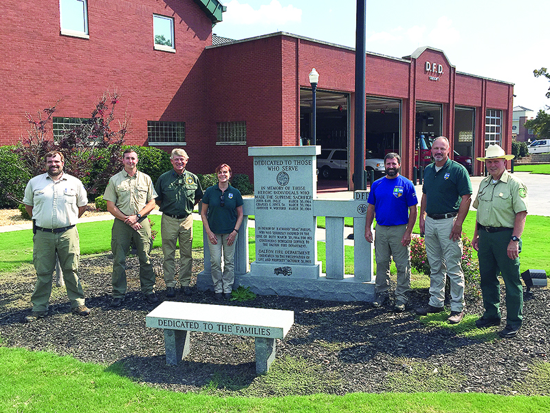Members of a newly formed fire prevention education team comprised of personnel from the Georgia Forestry Commission (GFC) and U.S. Forest Service (USFS) are pictured outside the team’s headquarters, the Dalton Fire Department. From left: Seth Hawkins (GFC), Anthony English (GFC), Mark Wiles (USFS), Stasia Kelly (GFC), Shawn Alexander (USFS), Keith Moss (GFC) and Mike Davis (USFS).