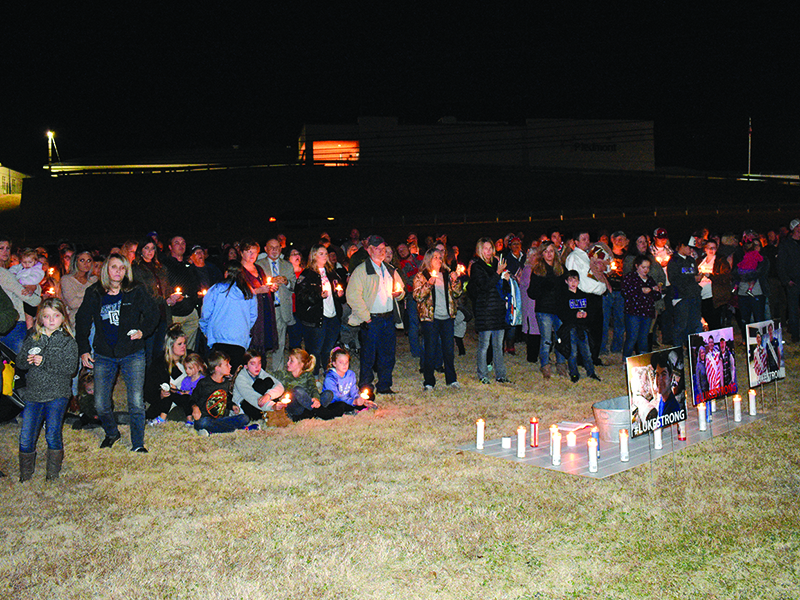 Gilmer students and community members showed up at a candlelight vigil held at River Park Sunday night to support Luke Crump, who was injured in an accident Nov. 12.