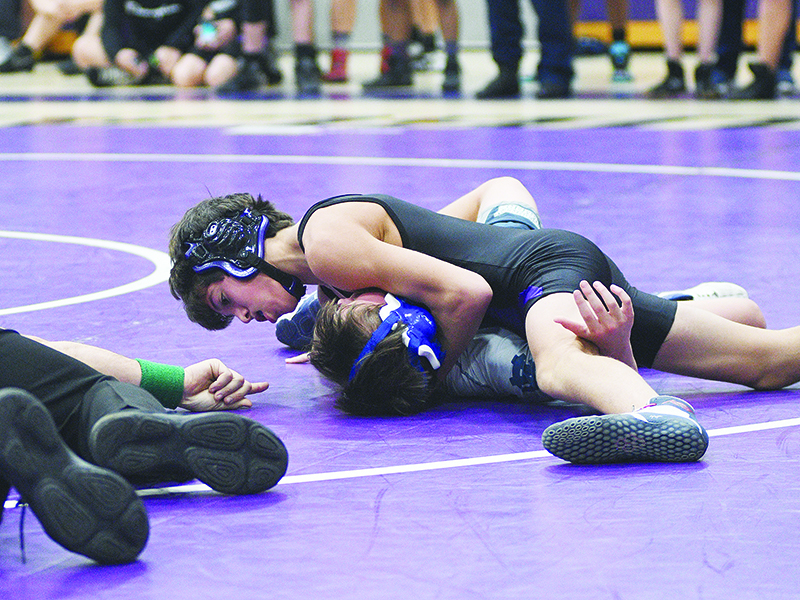 Carson Farist pins his White County opponent, and Clear Creek Middle school won the dual, 59-21.