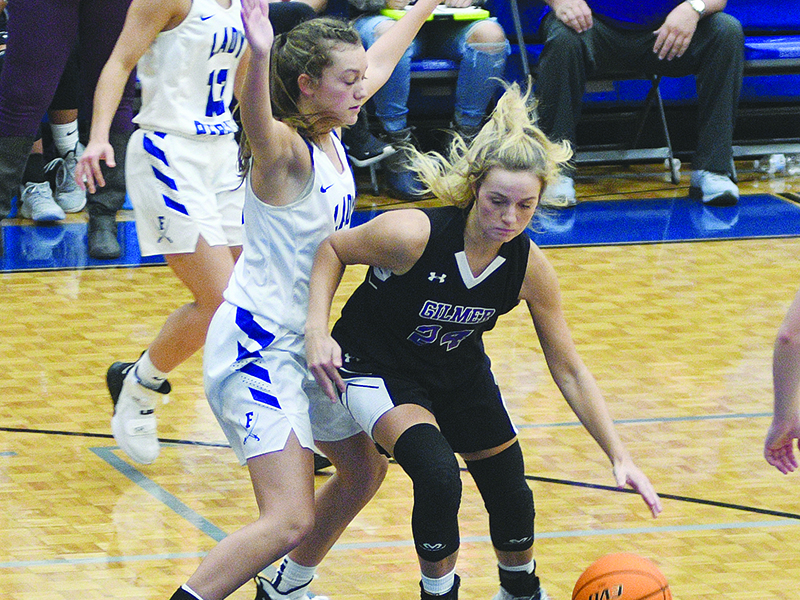 Gilmer’s Emma Callihan makes her way into the lane against Fannin County.