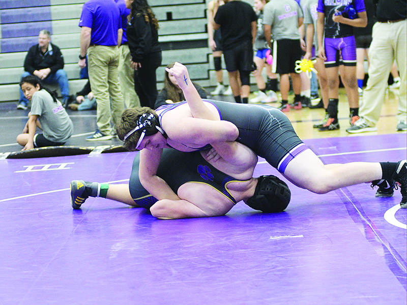 Luke Morgan works on pinning his Union County opponent last Wednesday.