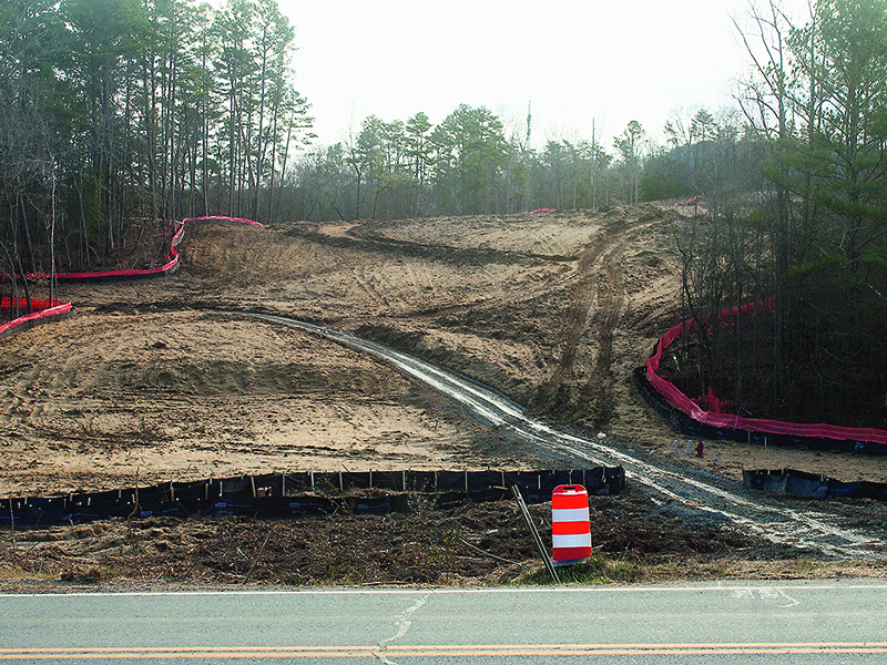 Pictured is a swath cut through wooded land off Old Highway 5 that will be used in the forthcoming connection of Highways 382 and 515. The Georgia Department of Transportation highway extension project is expected to last into 2021.