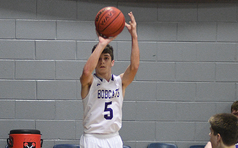 Bobcat Talyn Curtis shoots a baseline jumper against Union County in the Mountain League Championship.