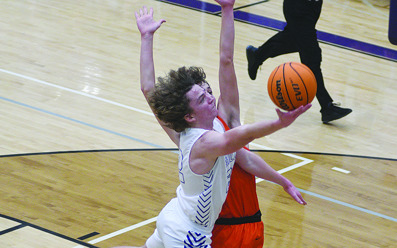 Bobcat Braden Jenkins drives to the basket and scored a season-high 28 points in Gilmer 21-point win versus Pickens.