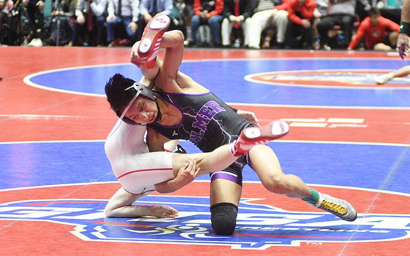 Gilmer wrestler Lucas Lopez during the state finals against Woodward Academy.