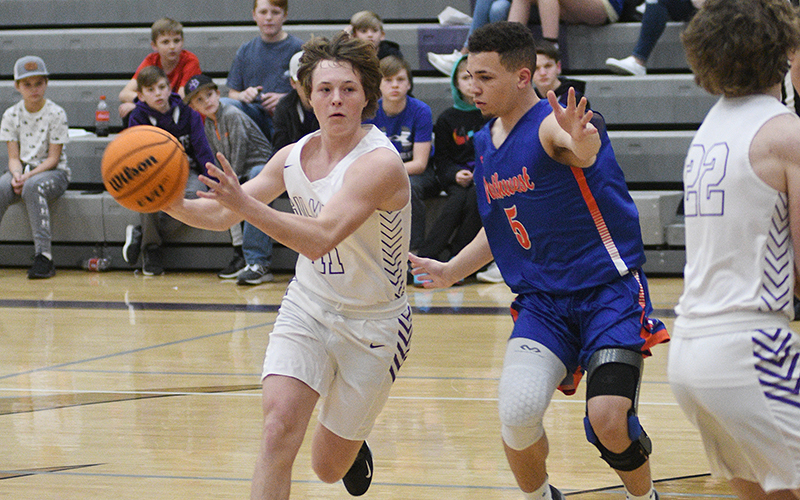 Bobcat senior Luke Wimpey passes to a teammate and scored 11 points against Northwest Whitfield last Tuesday.