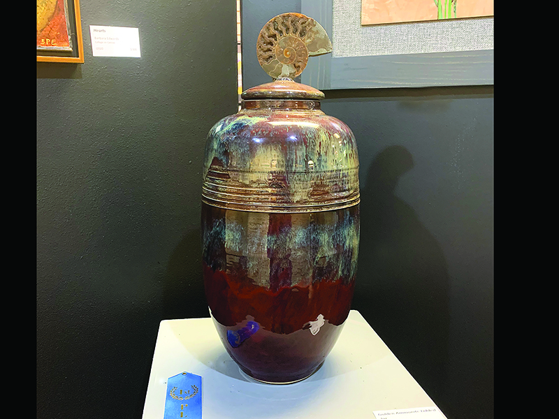 A lidded jar made by Sheryl Holstein was the first-place winner in the three-dimensional category.