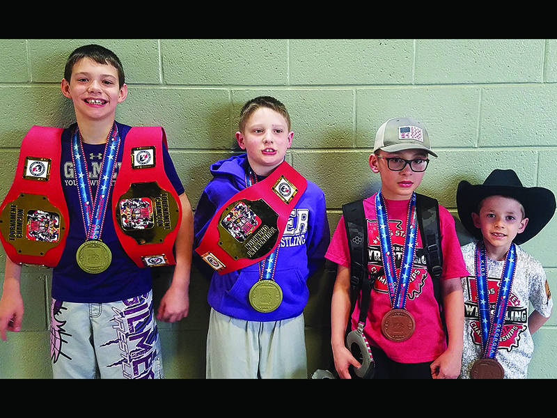 The Georgia Kids State Championship was held last weekend, and four Gilmer Bobcat Club wrestlers earned medals in the “little kids” division. From left, are state champions Isaiah Goodwin and Parker Settel, fifth-place finisher Keigan Brookshire and third-place finisher Dawson Duncan.