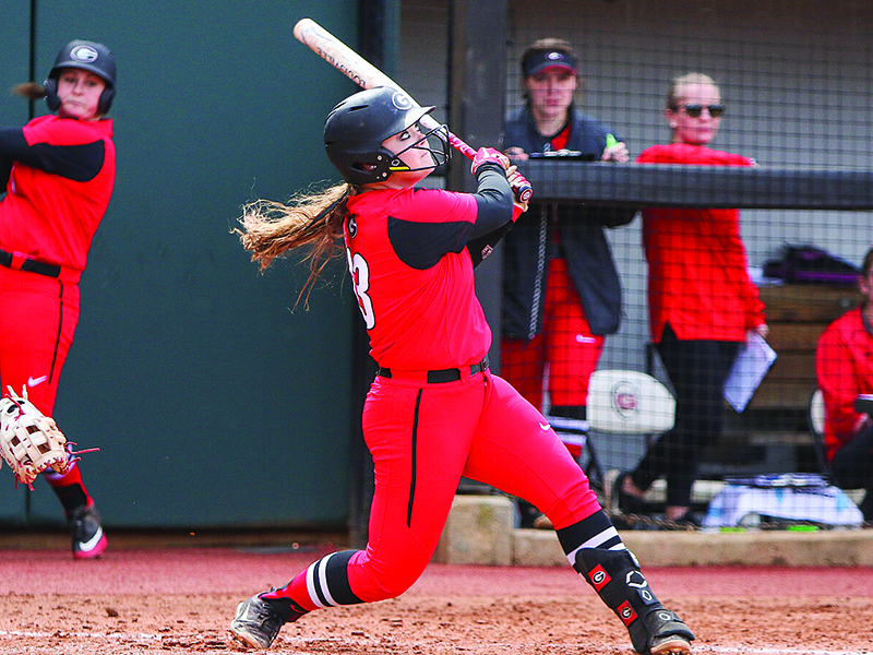 Gilmer High School alum Sara Mosley launches the ball into orbit for the University of Georgia during her freshman season earlier this spring.
