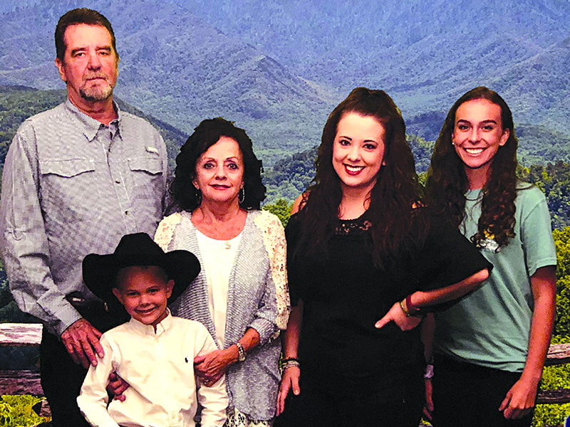 Below, From left, Dale is pictured with wife, Angie, daughter, Whitney, granddaughter, Carly and in front, grandson, Dean.