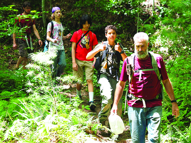 Jay Zipperman, front, leads a nature awareness hike during a 2019 Mountain Wisdom summer camp.  