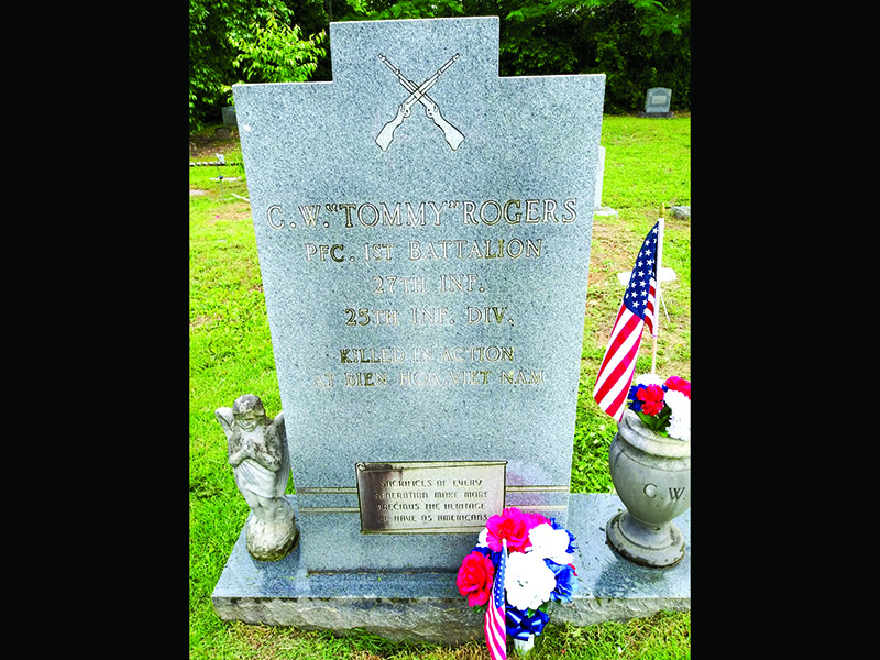 The headstone of Clarance W. ‘Tommy’ Rogers at Varnell Cemetery in north Whitfield county, killed in Vietnam on June 16, 1967. An inscription reads, “Sacrifices of every generation make more precious the heritage we have as Americans.