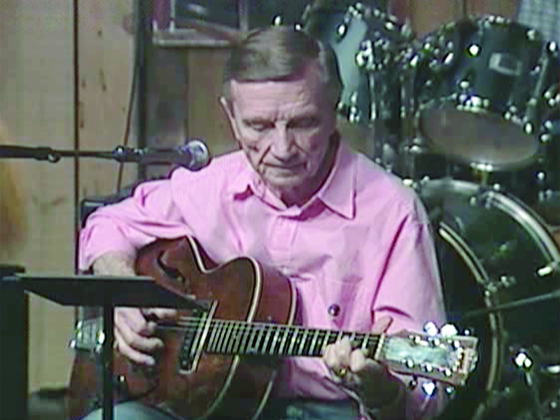 Larry Davis picks a tune on an episode of the ETC-3 television program Mountain Music.