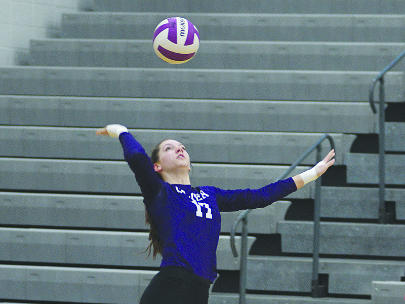 Adrian Thompson serves for the Lady Cats and had two aces versus Lumpkin County last week.