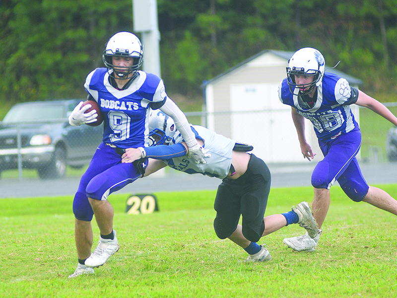 Clear Creek Middle School’s Talyn Curtis tries to get loose around the corner for the eighth-grade Bobcats.