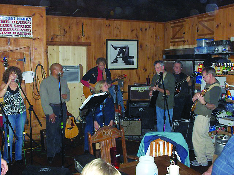 Terry Ellis, Mike Bean, Chris Curtin, Chuck Mitchell, Don Roberts and Frank Enos join in a past music night at The Blue Door Cafe.