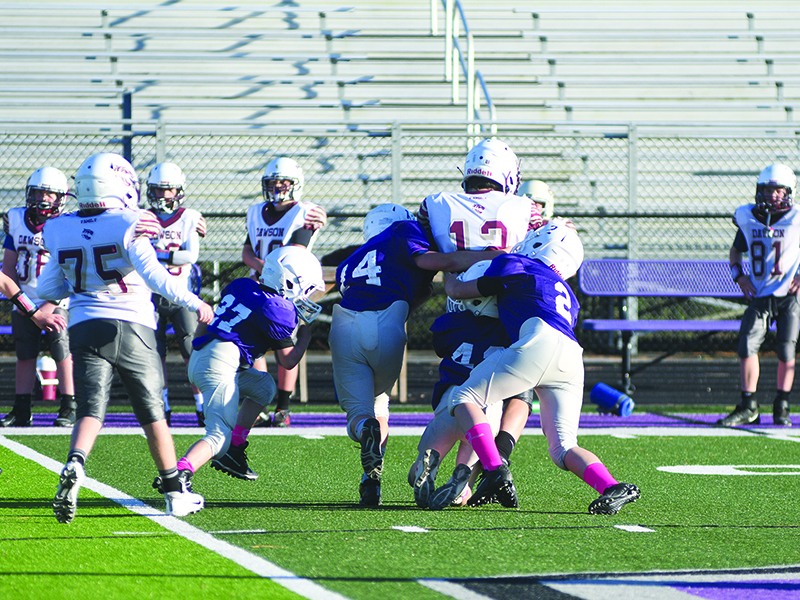 The 11-under Bobcats rally to make a tackle against Dawson County and will face Chestatee Saturday for the championship.