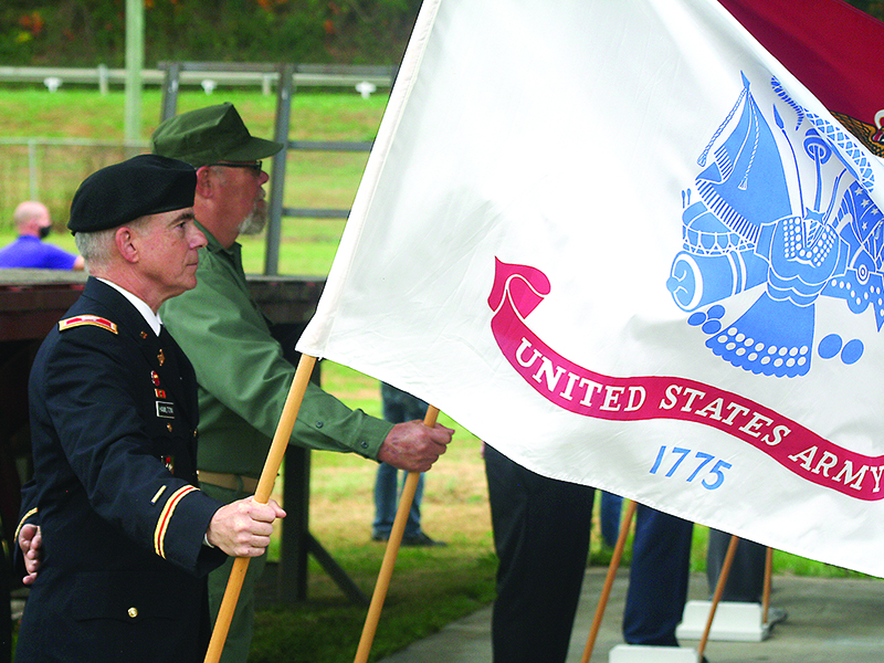 Col. Tom Hamilton, left, and Dorsey Summers, right, represent the U.S. Army and Marine Corps, respectively, in the ceremony’s color guard.