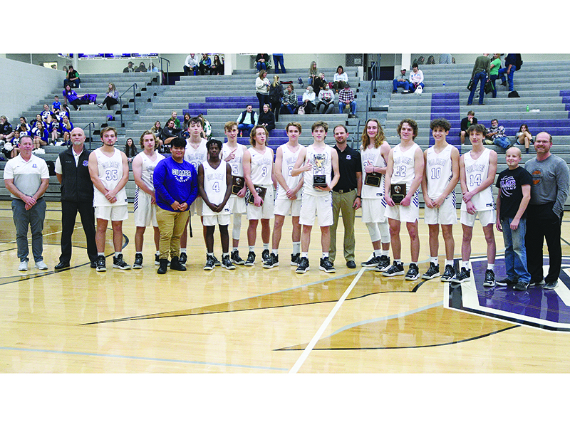 Above are Gilmer High School basketball players, coaches and managers following the Bobcats’ tip-off tournament championship last Tuesday.