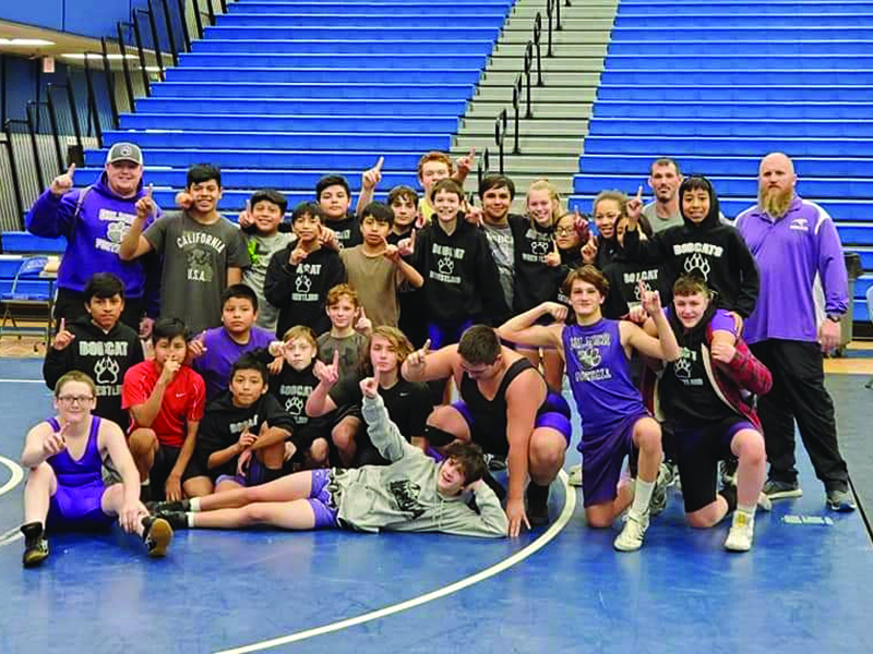 Above are Clear Creek wrestlers and coaches following their traditional league championship last Saturday.