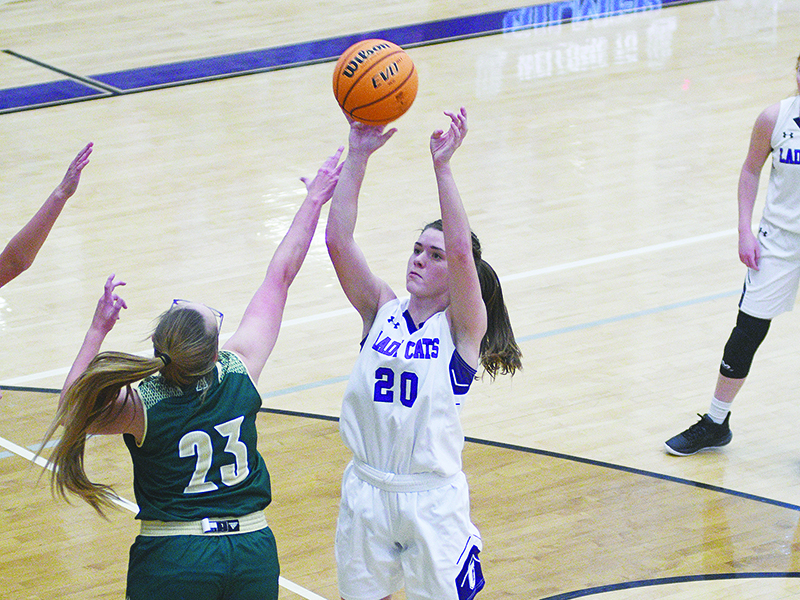 Lady Cat Emma Deyton puts up a jump shot in the post in the Lady Cats’ trouncing of Adairsville last Saturday, and she led GHS with 12 rebounds.