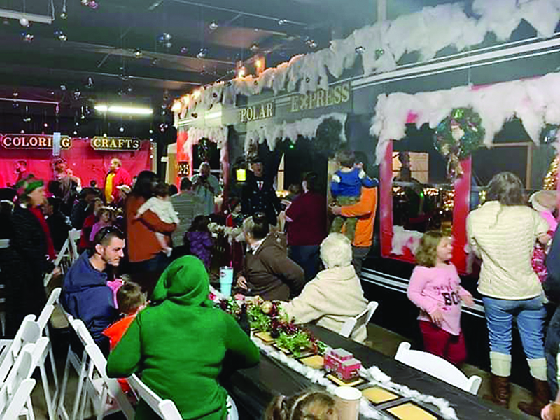 Attendees enjoy a 2019 “Polar Express” Christmas party at the Ellijay American Legion. 