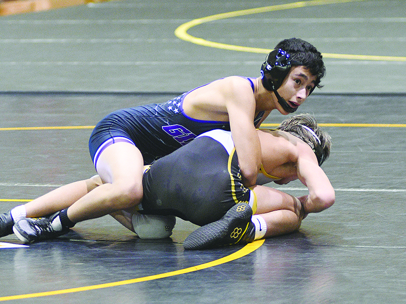 Gilmer Bobcat wrestler Arturo Gonzalez secured a win for GHS last Saturday as the Bobcats qualified for the Class 3A state duals.