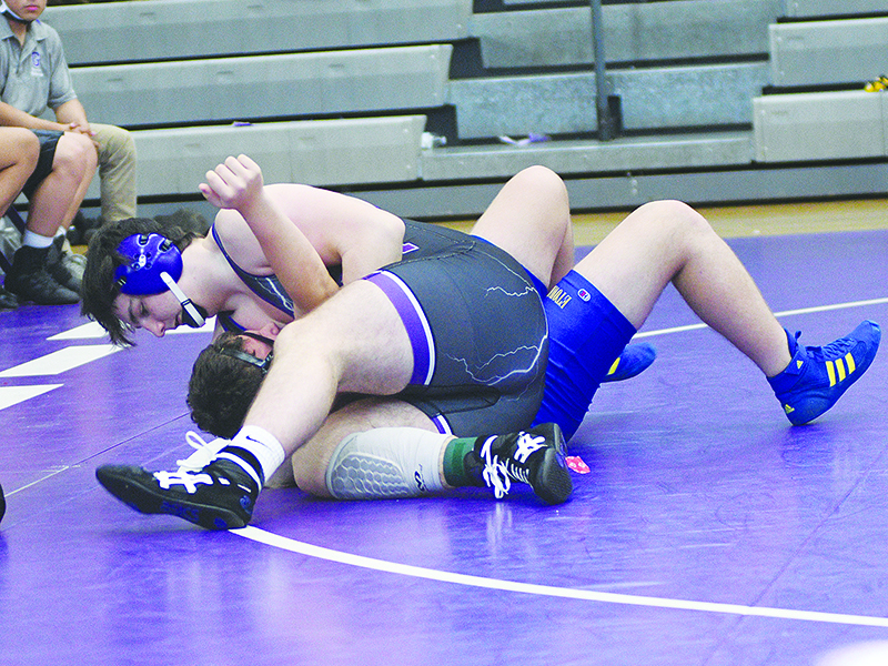 Gilmer High School junior Dylan Galloway is moments away from pinning his Etowah opponent last  Saturday.