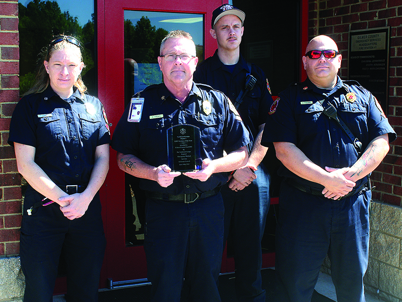 From left, Tiffany Czirok, Gilmer EMS Chief Russell Brown, Jesse Parks and Aaron Freeman with the EMS of the Year Award the local emergency medical services department recently received from Northwest Georgia EMS Region 1.