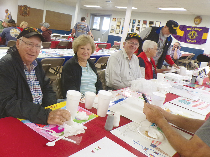 Enjoying the Lions Club complimentary Veterans lunch.