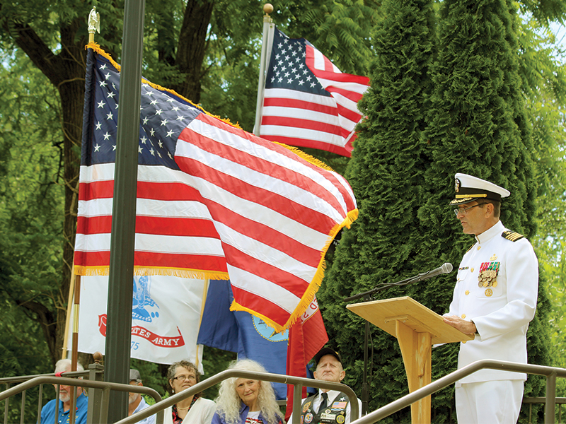 U.S. Navy Capt. Greg Sandway (Ret.) gives the keynote address during the Memorial Day service at Gilmer Veterans Park. In emphasizing the sacrifice for freedom, he quoted Gen. Dwight D. Eisenhower: “Victory at any cost does not come at bargain prices.”