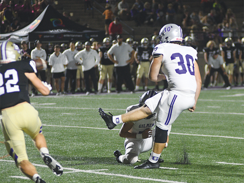 Gilmer’s Issac Rellinger holds for senior kicker Noah Turner’s 21-yard field goal versus Lumpkin County last Friday. Turner has made 2/3 field goal attempts and 22/22 extra points this season.