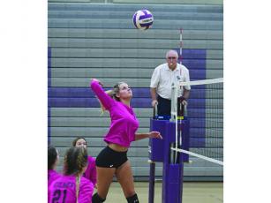Gilmer High’s Elly Callihan goes up for a kill and was selected to the all-region team to cap her senior season.