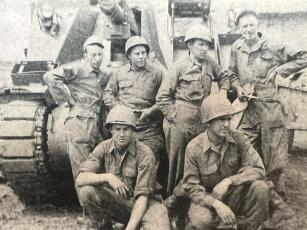 Ralph Painter, standing at right, with his D-7 "Priest" 105mm armored howitzer crew that landed on Utah Beach and was involved in the Battle of the Bulge in World War II. (Contributed photo)