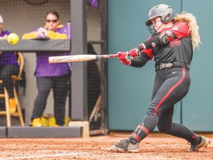 Georgia’s Sara Mosley laces one of five hits versus LSU on April 23 to become the second player in school history with a five-hit game. Pictured courtesy Mackenize Miles/UGA Athletics. 