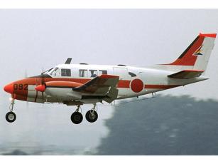 A Beechcraft Queen airplane similar to the one in this file photo was refitted to carry 18 canisters of cocaine weighing around 50 pounds each. Authorities said in 1982 the street drug price of each canister would have brought up to $25 million. (Wikipedia Photo)