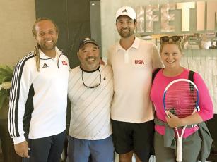 Bill Ozaki is  shown, second from left, at a 2020 USTA player development camp alongside Jon Glover, USTA national coach; tennis touring pro Brian Baker and U.S. Federation Cup coach Kathy Rinaldi. 