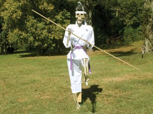 Karate-kicking skeleton scarecrow by United Karate Studios