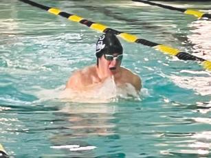 Bobcat Larz Fowler swims the breaststroke at last Saturday’s TikTok Klassic in Calhoun.