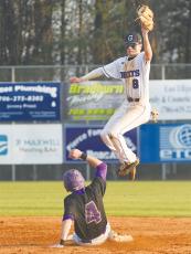 Gilmer shortstop Eli Cooper goes up to haul in a high throw versus Lumpkin County last Thursday.