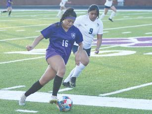 Gilmer High’s Yenifer Lopez dribbles downfield and scored a goal in the Lady Cats’ match versus Dawson County last Tuesday.